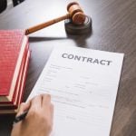 "In Default" and "Breach" in Contract Law