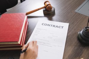"In Default" and "Breach" in Contract Law