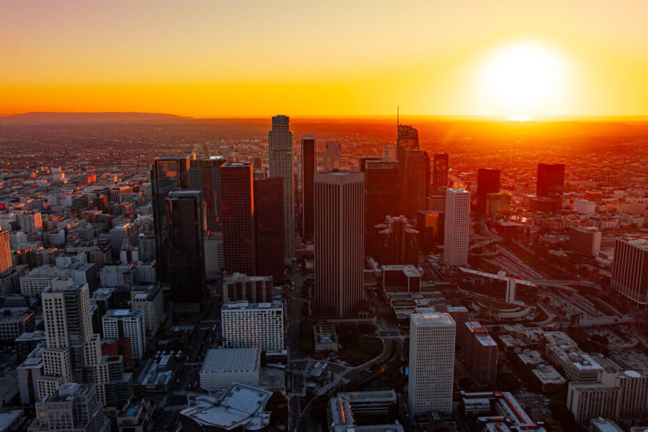 Aerial view of Los Angeles financial district skyscrapers at dusk representing corporate PAGA defense.