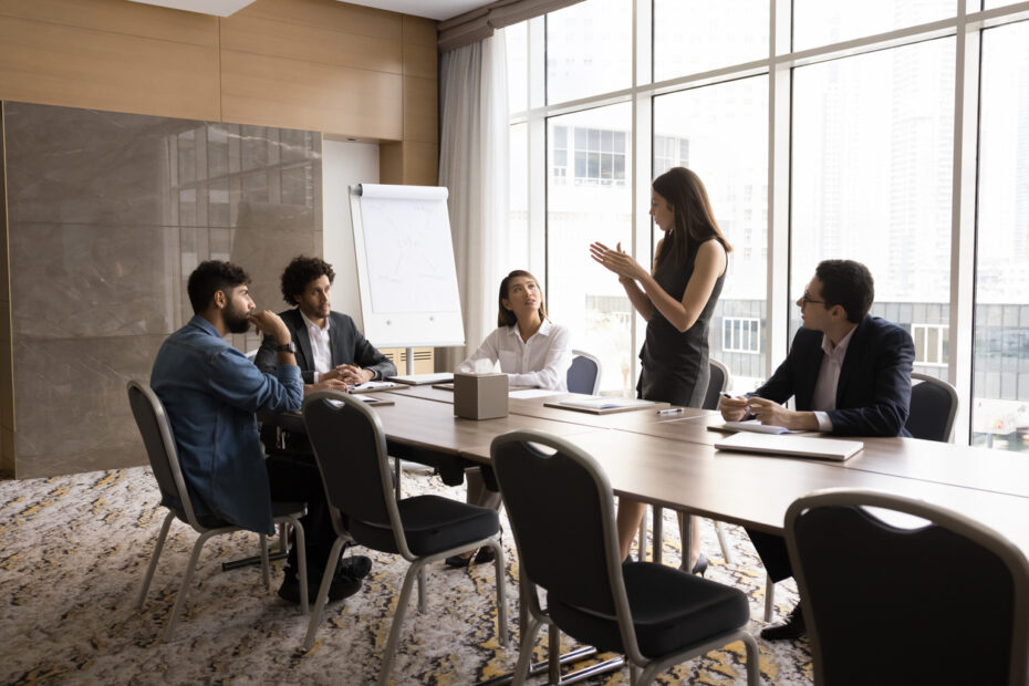 Serious corporate professionals in an executive boardroom representing California asset protection defense