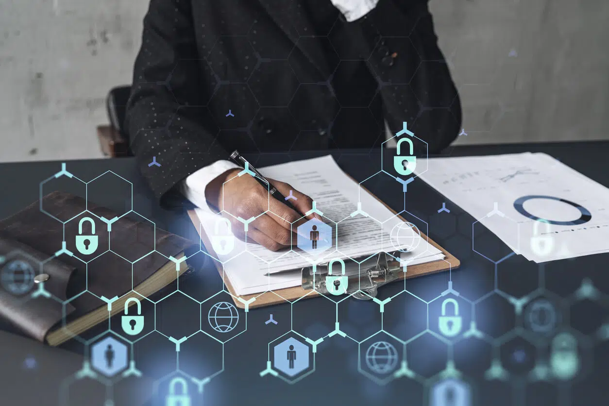 California business executive reviewing a data privacy compliance checklist on a laptop.