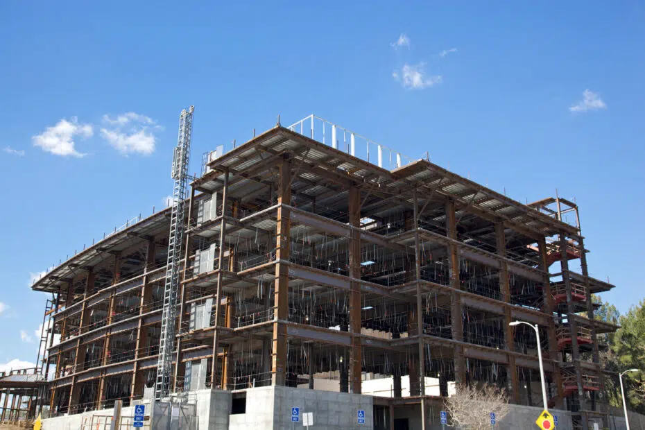 Commercial building construction site representing high-stakes real estate title defense and expunging a frivolous lis pendens.