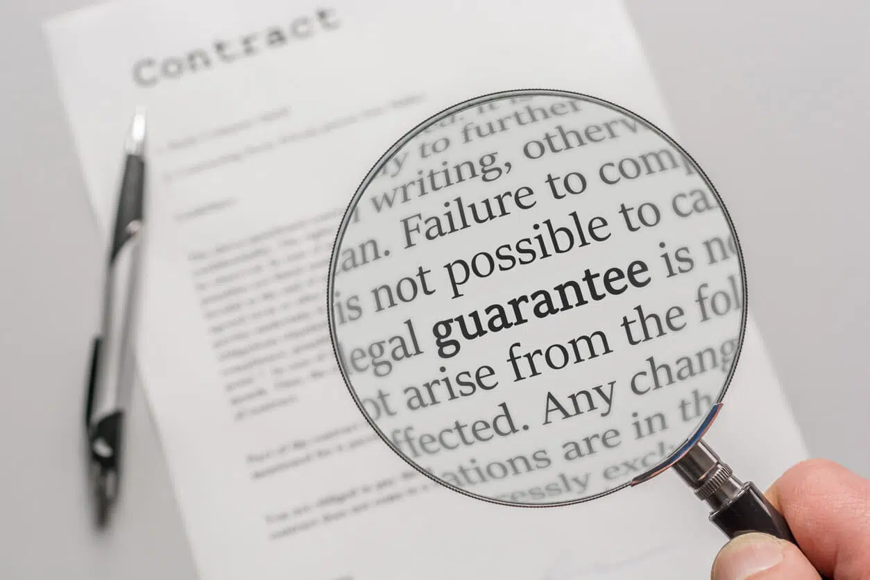 Corporate contract under audit with a magnifying glass showing compliance review.