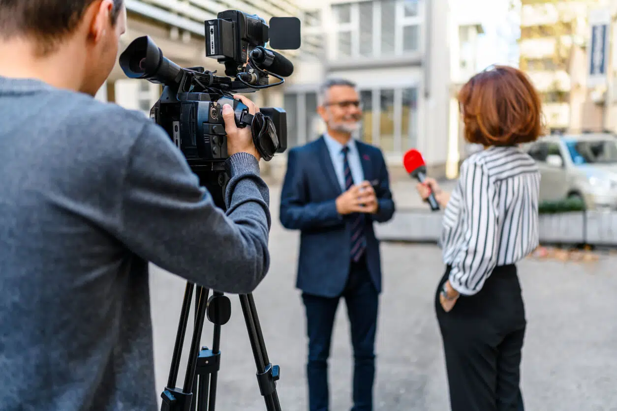 Journalistic interview with an entertainment executive highlighting public corporate disputes in Los Angeles.